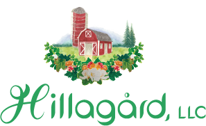 Hillagard brand logo and image of barn with green fields or pastures with lower half oval cloudberry & leaves frame